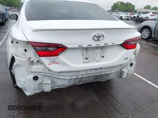 2023 Toyota Camry SE z VIN 4T1G11AK4PU738724, wystawiony jako IAAI lot #42123044 z przebiegiem 58 659 mil mil oraz . Historia ofert i sprzedaży dostępna na DreamBid. Obrazek 6.