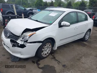 2012 Nissan Sentra S z VIN 3N1AB6APXCL636612, wystawiony jako IAAI lot #42610932 z przebiegiem 150 605 mil mil oraz . Historia ofert i sprzedaży dostępna na DreamBid. Obrazek 17.
