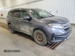 2019 Honda Pilot Touring 8-Passenger z VIN 5FNYF6H93KB502528, wystawiony jako Copart lot #51811045 z przebiegiem 157 204 mil mil oraz Czysty tytuł • Clean title. Historia ofert i sprzedaży dostępna na DreamBid. Obrazek 4.