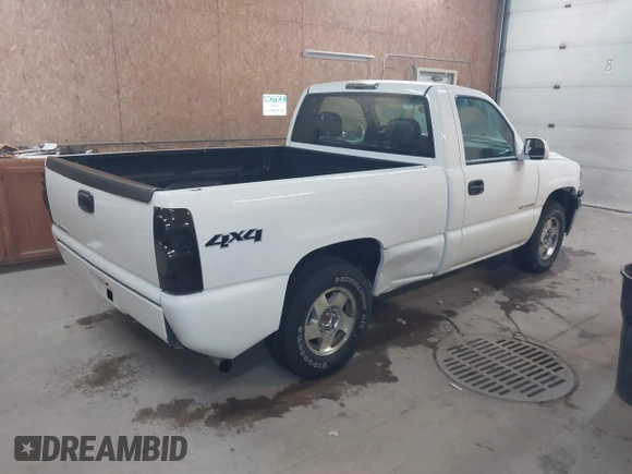 2002 Chevrolet Silverado 1500 LS with VIN 1GCEK14T02Z120888, listed as a IAAI auction lot 41504133 with 131,667 mi miles. Bid and sale history available at carsss.com. Image 4.