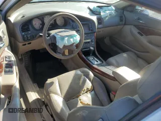 2001 Acura CL Type S z VIN 19UYA427X1A037670, wystawiony jako Copart lot #77014474 z przebiegiem 195 650 mil mil oraz Szkoda całkowita • Salvage title. Historia ofert i sprzedaży dostępna na DreamBid. Obrazek 8.
