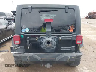 2012 Jeep Wrangler Unlimited Rubicon with VIN 1C4HJWFGXCL142804, listed as a IAAI auction lot 42183960 with 124,392 mi miles and . Bid and sale history available at DreamBid. Image 16.