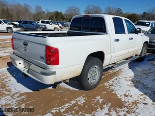 2005 Dodge Dakota Laramie with VIN 1D7HE58N35S138912, listed as a IAAI auction lot 41359470 with 263,136 mi miles. Bid and sale history available at carsss.com. Image 4.