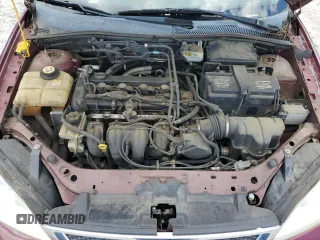 2006 Ford Focus S z VIN 1FAFP34N36W171785, wystawiony jako Copart lot #55815195 z przebiegiem 164 074 mil mil oraz Szkoda całkowita • Salvage title. Historia ofert i sprzedaży dostępna na DreamBid. Obrazek 11.