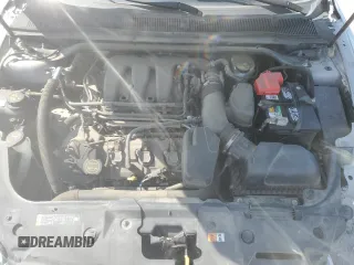 2015 Ford Taurus SEL with VIN 1FAHP2E80FG121013, listed as a Copart auction lot 59940235 with 209,632 mi miles and Clean title. Bid and sale history available at DreamBid. Image 11.