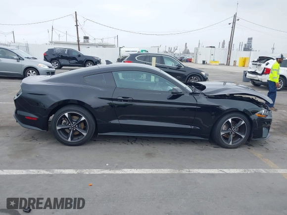 2021 Ford Mustang EcoBoost z VIN 1FA6P8TH7M5115490, wystawiony jako IAAI lot #42428724 z przebiegiem 47 417 mil mil oraz . Historia ofert i sprzedaży dostępna na DreamBid. Obrazek 13.
