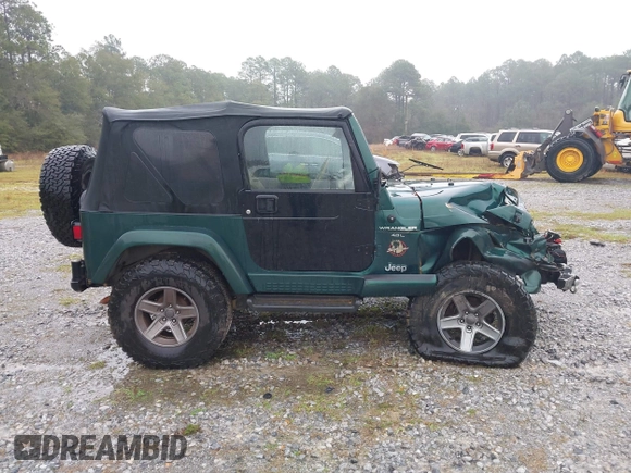 2000 Jeep Wrangler Sahara with VIN 1J4FA59SXYP701098, listed as a IAAI auction lot 41592872 with 1 mi miles. Bid and sale history available at carsss.com. Image 12.