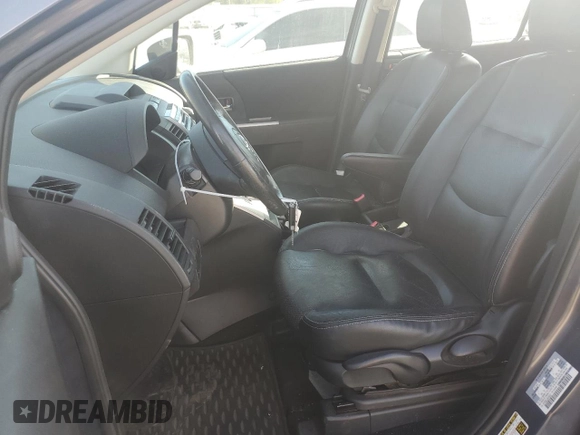 2009 Mazda 5 Sport with VIN JM1CR29L290348021, listed as a Copart auction lot 75912434 with 84,022 mi miles and Salvage title. Bid and sale history available at DreamBid. Image 7.