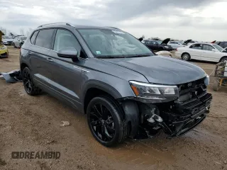2022 Volkswagen Taos SE z VIN 3VVLX7B28NM041868, wystawiony jako Copart lot #53472735 z przebiegiem 80 509 mil mil oraz Szkody całkowita. Historia ofert i sprzedaży dostępna na DreamBid. Obrazek 4.