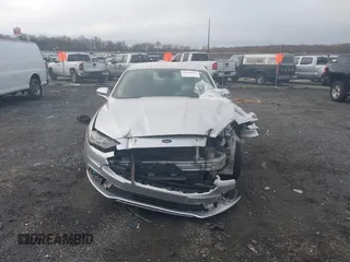 2018 Ford Fusion SE z VIN 3FA6P0HD2JR207865, wystawiony jako IAAI lot #41835895 z przebiegiem 91 069 mil mil oraz . Historia ofert i sprzedaży dostępna na DreamBid. Obrazek 12.