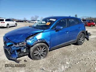 2017 Mazda CX-3 Touring with VIN JM1DKFC71H0149617, listed as a Copart auction lot 43625215 with 71,828 mi miles and Salvage Title. Bid and sale history available at DreamBid. Image 1.