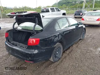 2013 Volkswagen Jetta SE z VIN 3VWDP7AJXDM289031, wystawiony jako IAAI lot #42325596 z przebiegiem 157 774 mil mil oraz . Historia ofert i sprzedaży dostępna na DreamBid. Obrazek 4.