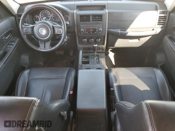 2012 Jeep Liberty Sport with VIN 1C4PJLAK7CW179474, listed as a Copart auction lot 54071285 with 130,312 mi miles and Salvage Title. Bid and sale history available at DreamBid. Image 8.