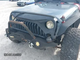 2007 Jeep Wrangler Unlimited Sahara with VIN 1J4GB59167L221686, listed as a IAAI auction lot 42473996 with 151,065 mi miles and . Bid and sale history available at DreamBid. Image 6.