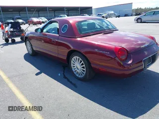 2004 Ford Thunderbird Deluxe with VIN 1FAHP60A64Y105598, listed as a IAAI auction lot 41806334 with 18,583 mi miles and . Bid and sale history available at DreamBid. Image 3.
