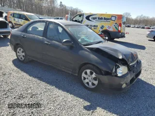2004 Kia Spectra LX with VIN KNAFE121X45021922, listed as a Copart auction lot 49989845 with 184,189 mi miles and Salvage Title. Bid and sale history available at carsss.com. Image 4.