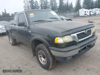 1999 Mazda B-Series 4WD Truck SE with VIN 4F4ZR17X5XTM17667, listed as a IAAI auction lot 41896804 with 101,596 mi miles. Bid and sale history available at carsss.com. Image 1.