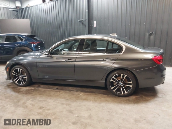 2018 BMW 3 Series 330i xDrive with VIN WBA8D9C51JEM34061, listed as a IAAI auction lot 42682318 with 65,245 mi miles and . Bid and sale history available at DreamBid. Image 14.
