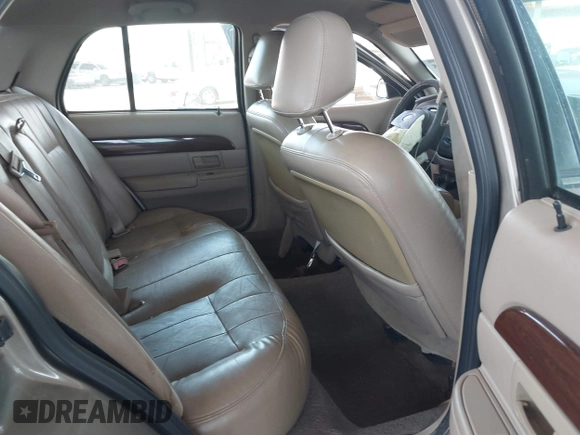 2003 Mercury Grand Marquis LS Premium with VIN 2MEFM75W23X613004, listed as a IAAI auction lot 41974625 with 151,023 mi miles and . Bid and sale history available at DreamBid. Image 8.