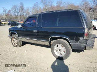 1998 Chevrolet Tahoe z VIN 3GNEK18R9WG123185, wystawiony jako Copart lot #53020915 z przebiegiem 310 261 mil mil oraz Nie do naprawy. Historia ofert i sprzedaży dostępna na DreamBid. Obrazek 2.
