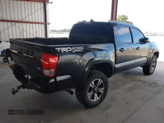 2016 Toyota Tacoma SR with VIN 5TFCZ5AN8GX020900, listed as a IAAI auction lot 41911329 with 133,931 mi miles. Bid and sale history available at carsss.com. Image 4.