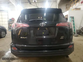 2018 Toyota RAV4 LE with VIN 2T3BFREV2JW846661, listed as a Copart auction lot 51097155 with 68,608 mi miles and Salvage Title. Bid and sale history available at carsss.com. Image 6.