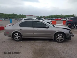 2002 Nissan Maxima GLE z VIN JN1DA31A32T308663, wystawiony jako IAAI lot #42136460 z przebiegiem 235 632 mil mil oraz . Historia ofert i sprzedaży dostępna na DreamBid. Obrazek 13.