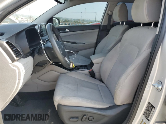 2019 Hyundai Tucson SEL with VIN KM8J33AL7KU841214, listed as a Copart auction lot 59331185 with 99,150 mi miles and Salvage title. Bid and sale history available at DreamBid. Image 7.