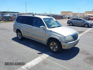 2002 Suzuki XL-7 with VIN JS3TY92V724105263, listed as a IAAI auction lot 41858262 with 103,249 mi miles. Bid and sale history available at carsss.com. Image 1.