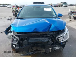 2023 Kia Rio S with VIN 3KPA25AD4PE558982, listed as a IAAI auction lot 41338270 with 40,965 mi miles and . Bid and sale history available at DreamBid. Image 13.