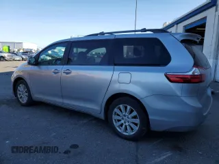 2017 Toyota Sienna LE with VIN 5TDJZ3DC0HS177477, listed as a Copart auction lot 89284545 with 94,598 mi miles and Salvage Title. Bid and sale history available at carsss.com. Image 2.
