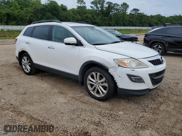 2012 Mazda CX-9 Grand Touring z VIN JM3TB2DA7C0358374, wystawiony jako Copart lot #58741885 z przebiegiem 127 162 mil mil oraz Czysty tytuł • Clean title. Historia ofert i sprzedaży dostępna na DreamBid. Obrazek 4.