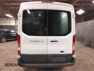 2016 Ford Transit Cargo with VIN 1FTYE1CM0GKA13242, listed as a IAAI auction lot 41655642 with 107,589 mi miles and . Bid and sale history available at carsss.com. Image 17.