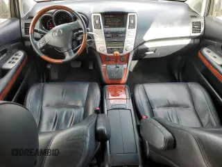 2007 Lexus RX 400h z VIN JTJGW31U972002681, wystawiony jako Copart lot #78883974 z przebiegiem 288 019 mil mil oraz Szkody całkowita. Historia ofert i sprzedaży dostępna na DreamBid. Obrazek 8.