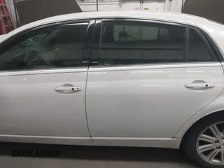 2005 Toyota Avalon XL with VIN 4T1BK36B55U013349, listed as a IAAI auction lot 41879384 with 185,821 mi miles and . Bid and sale history available at DreamBid. Image 14.
