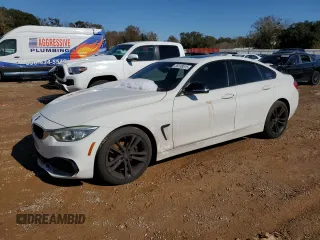 2015 BMW 4 Series 428i z VIN WBA4A5C50FG051644, wystawiony jako Copart lot #89138515 z przebiegiem 142 065 mil mil oraz Szkoda całkowita • Salvage title. Historia ofert i sprzedaży dostępna na DreamBid. Obrazek 1.