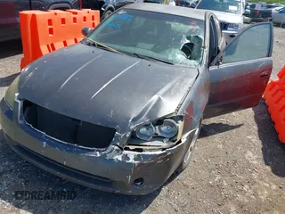 2006 Nissan Altima 2.5 S with VIN 1N4AL11DX6C215935, listed as a IAAI auction lot 41961191 with 1 mi miles. Bid and sale history available at carsss.com. Image 6.