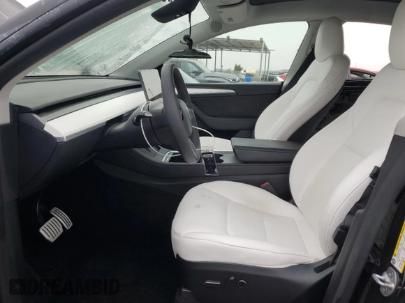 2024 Tesla Model Y Performance with VIN 7SAYGDEF1RF028278, listed as a Copart auction lot 48900935 with 41,606 mi miles and Salvage Title. Bid and sale history available at DreamBid. Image 7.