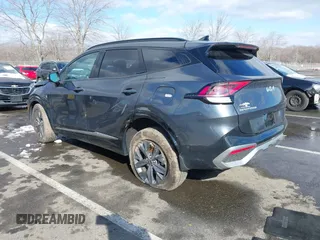 2023 Kia Sportage SX-Prestige with VIN KNDPXCAG5P7038476, listed as a IAAI auction lot 41532005 with 14,151 mi miles and . Bid and sale history available at DreamBid. Image 3.