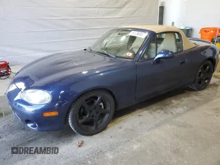 2001 Mazda MX-5 Miata with VIN JM1NB353510209224, listed as a Copart auction lot 51736955 with 103,732 mi miles and Salvage Title. Bid and sale history available at DreamBid. Image 1.