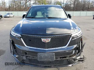 2021 Cadillac XT6 Sport z VIN 1GYKPGRS0MZ215942, wystawiony jako Copart lot #84830084 z przebiegiem 29 930 mil mil oraz Szkoda całkowita • Salvage title. Historia ofert i sprzedaży dostępna na DreamBid. Obrazek 5.