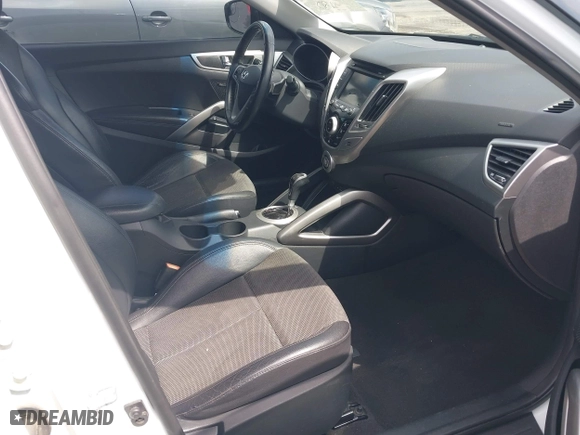 2015 Hyundai Veloster with VIN KMHTC6AD5FU231224, listed as a IAAI auction lot 41944186 with 103,124 mi miles. Bid and sale history available at carsss.com. Image 5.