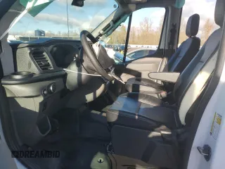 2023 Ford Transit Cargo z VIN 1FTBR1X8XPKB14862, wystawiony jako Copart lot #83661874 z przebiegiem Nie podano mil oraz Szkoda całkowita • Salvage title. Historia ofert i sprzedaży dostępna na DreamBid. Obrazek 7.