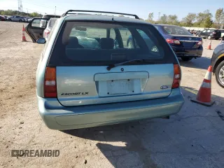 1997 Ford Escort LX with VIN 3FALP15P7VR172687, listed as a Copart auction lot 74506914 with 92,314 mi miles and Salvage Title. Bid and sale history available at carsss.com. Image 6.
