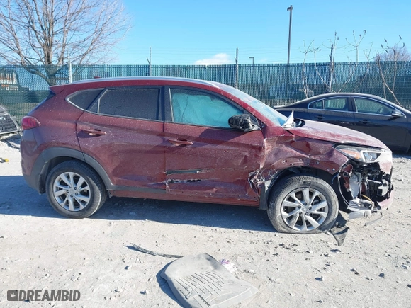 2020 Hyundai Tucson Value with VIN KM8J3CA42LU149811, listed as a IAAI auction lot 41642255 with 60,936 mi miles. Bid and sale history available at carsss.com. Image 12.