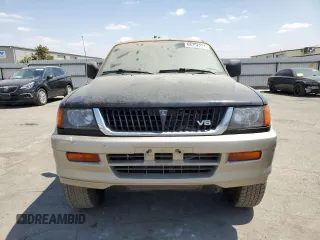 1998 Mitsubishi Montero z VIN JA4LS31PXWP014289, wystawiony jako Copart lot #68752234 z przebiegiem 189 886 mil mil oraz Czysty tytuł • Clean title. Historia ofert i sprzedaży dostępna na DreamBid. Obrazek 5.