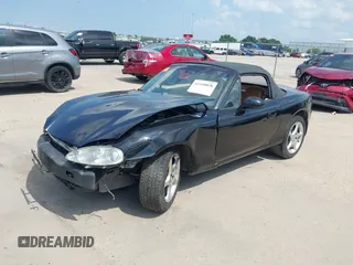 2002 Mazda MX-5 Miata Cloth with VIN JM1NB353520221312, listed as a IAAI auction lot 42410028 with 99,375 mi miles and . Bid and sale history available at DreamBid. Image 18.