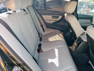 2013 BMW 3 Series 335i with VIN WBA3A9G57DNP36052, listed as a Copart auction lot 50204825 with 158,102 mi miles and Salvage title. Bid and sale history available at DreamBid. Image 10.