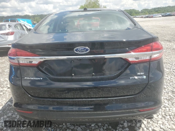 2018 Ford Fusion SE z VIN 3FA6P0LU6JR273861, wystawiony jako Copart lot #55722005 z przebiegiem 127 633 mil mil oraz Szkoda całkowita • Salvage title. Historia ofert i sprzedaży dostępna na DreamBid. Obrazek 6.