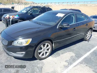 2016 Volvo S60 T5 Drive-E Premier with VIN YV126MFK5G2392022, listed as a IAAI auction lot 41517580 with 71,229 mi miles. Bid and sale history available at carsss.com. Image 2.